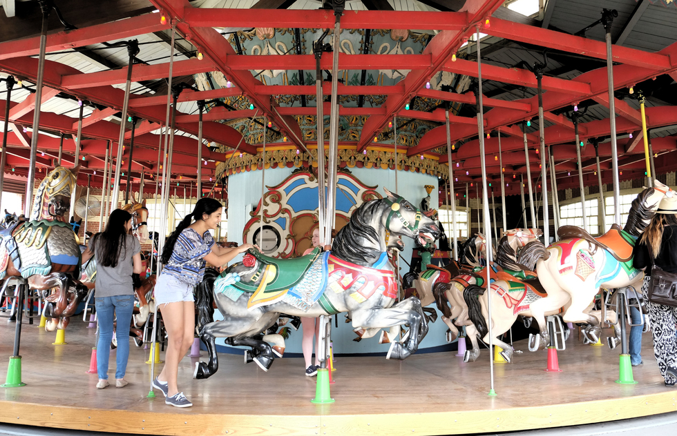 The friendly horses on the carousel are a perfect break from a day of sightseeing.